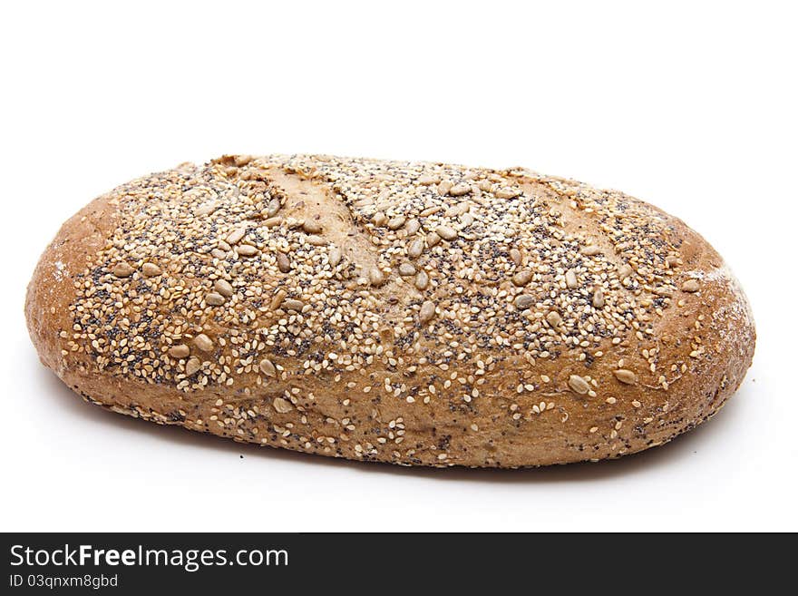 More grain bread baked and on white background