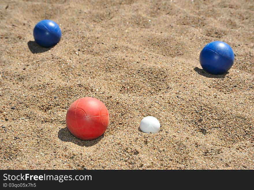 Bocce balls on a beach