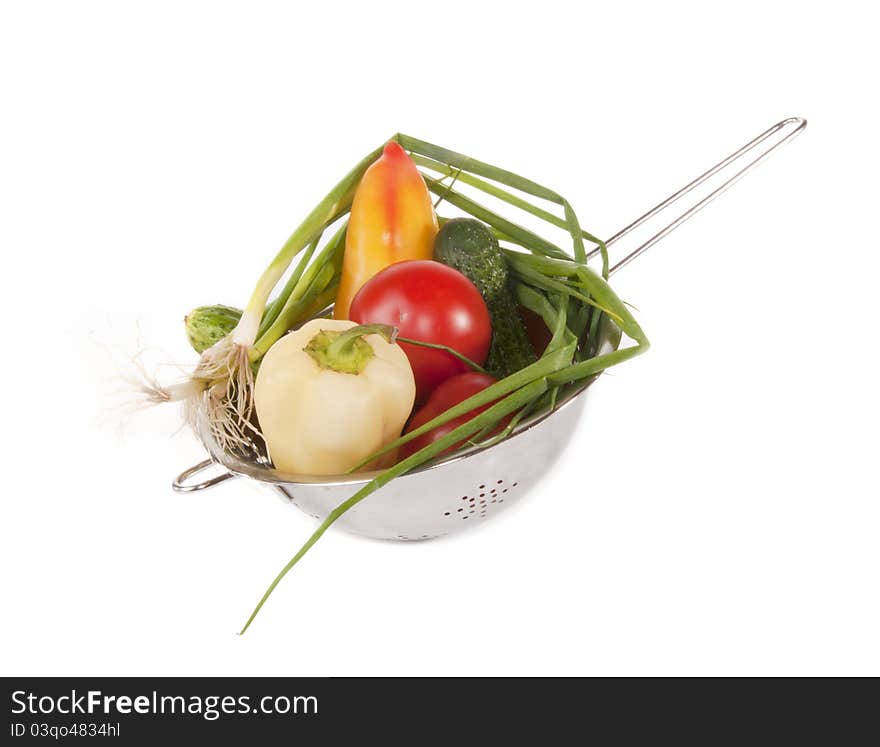 Vegetables in a sieve