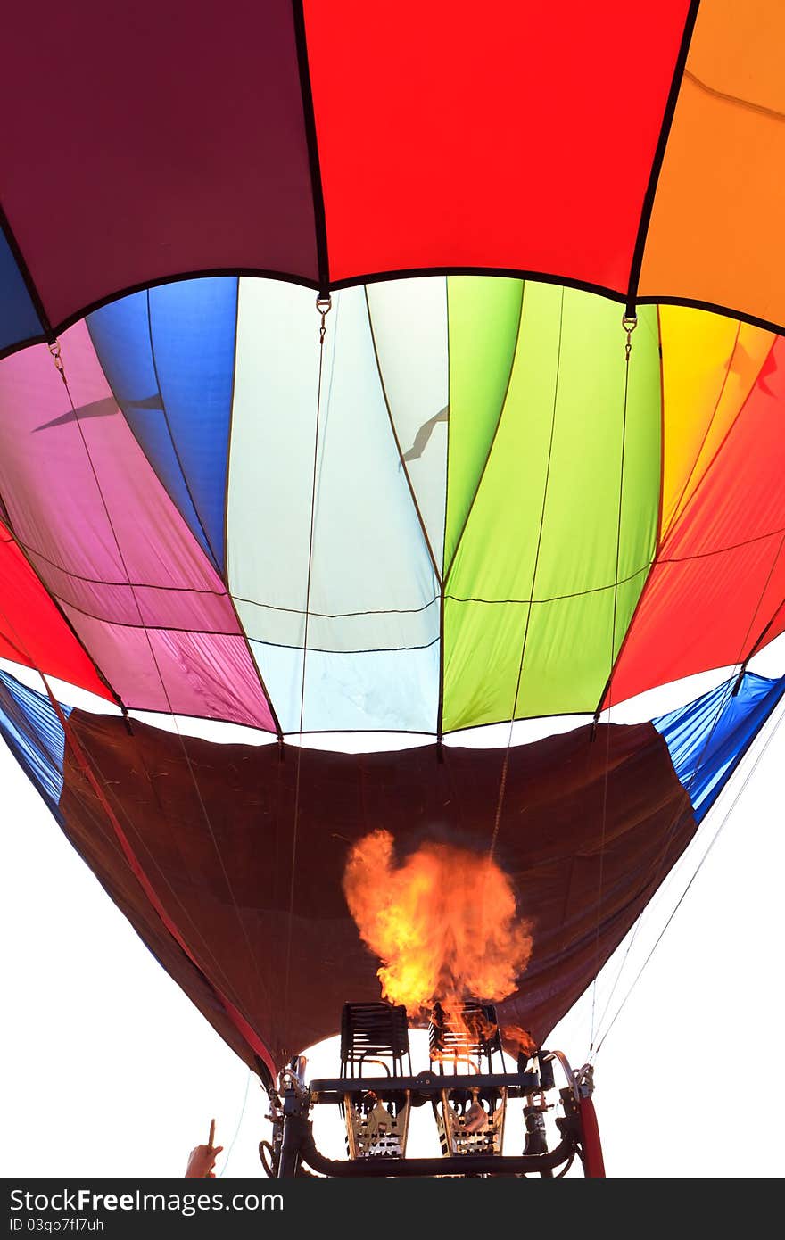 Colorful hot air balloon with flame