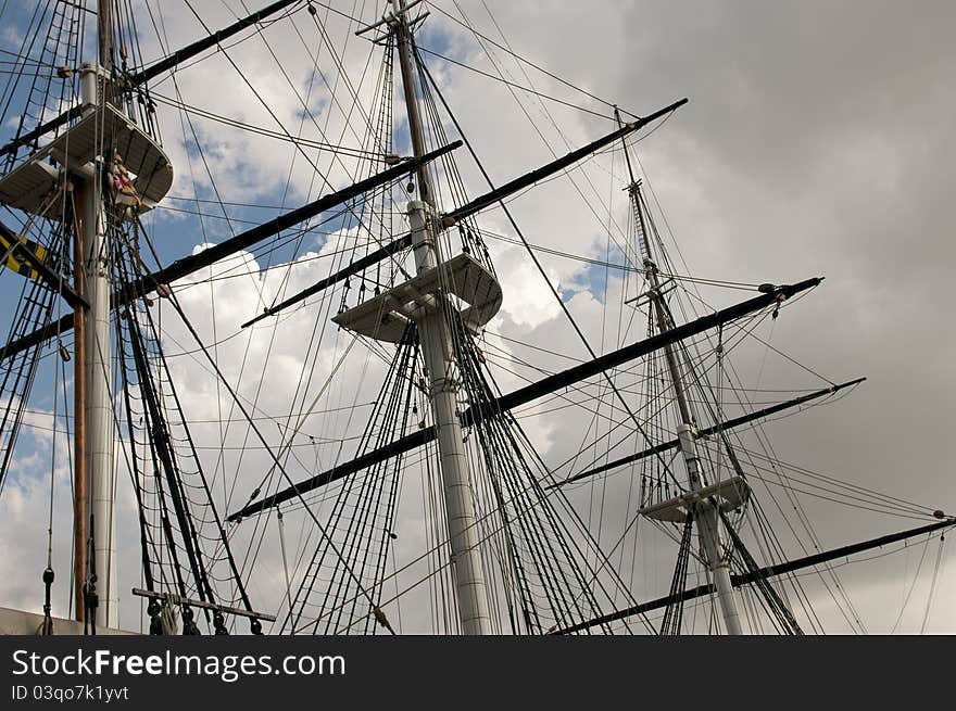 Details of tall mast and rigging of a large sailing boat. Details of tall mast and rigging of a large sailing boat.