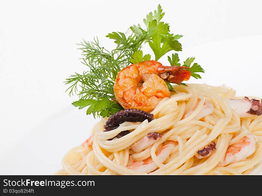 Spaghetti with seafood and cheese creamy sauce