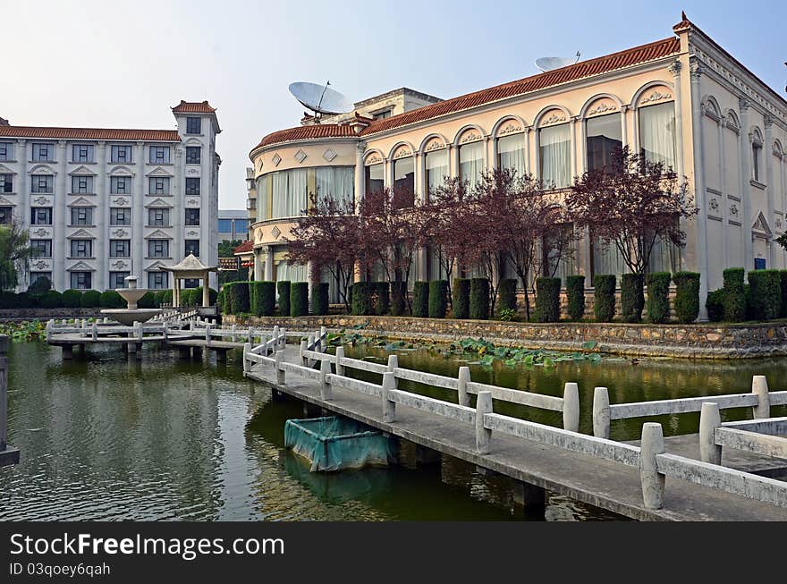 Hotel park with lake and bridge