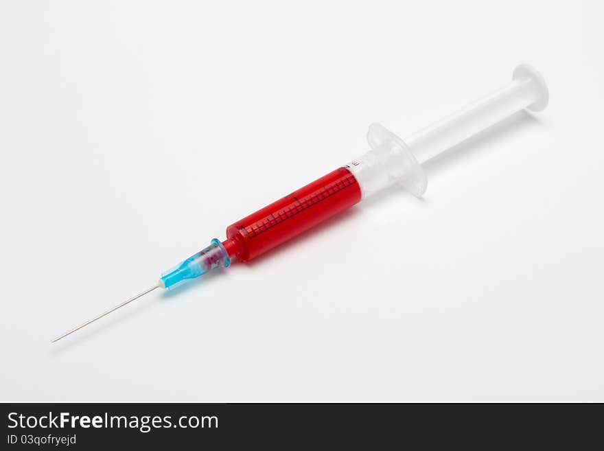 Syringe with blood