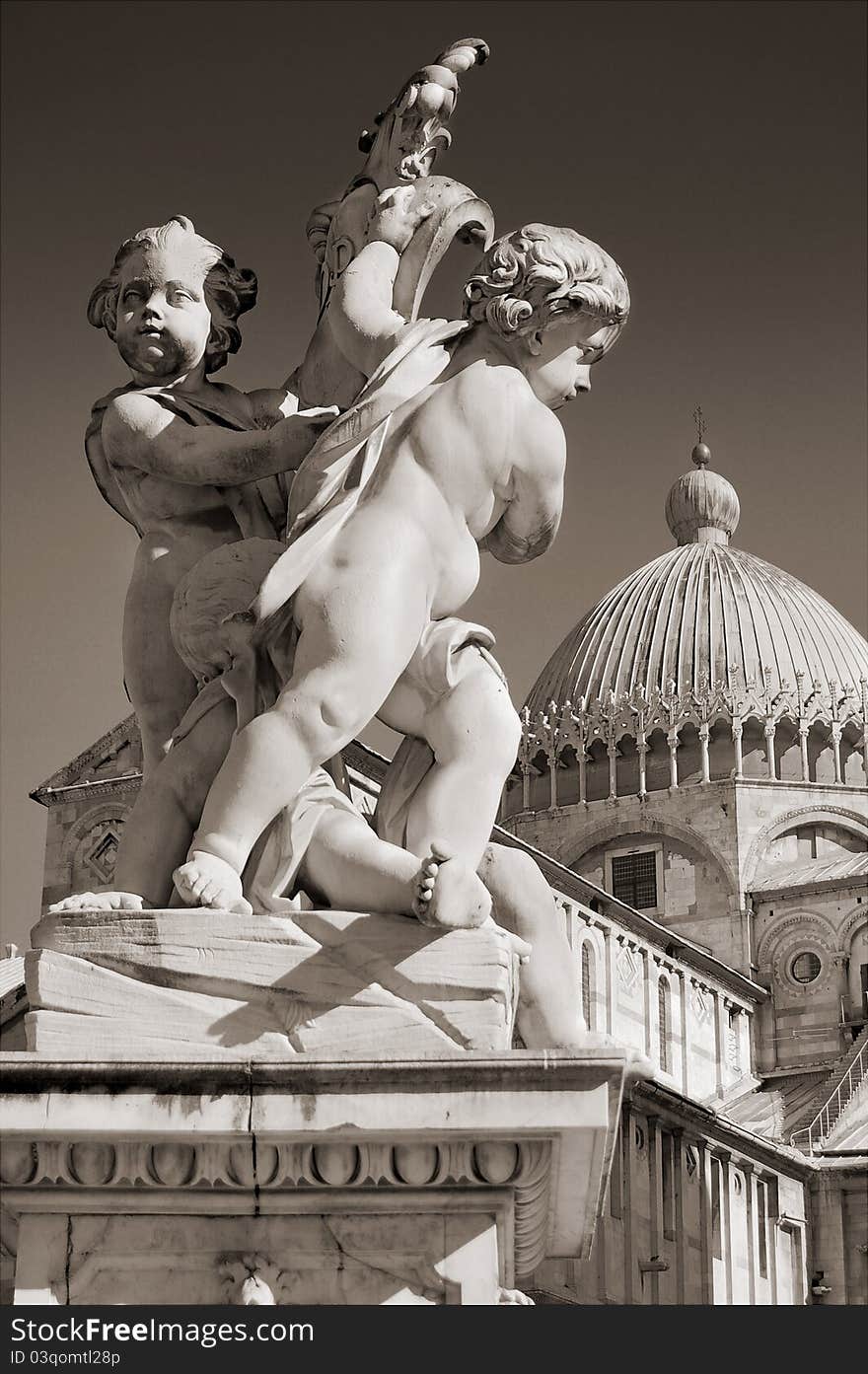 Pisa Duomo and The Fountain with Angels (La Fontana dei putti) in Pisa, Italy. Pisa Duomo and The Fountain with Angels (La Fontana dei putti) in Pisa, Italy.