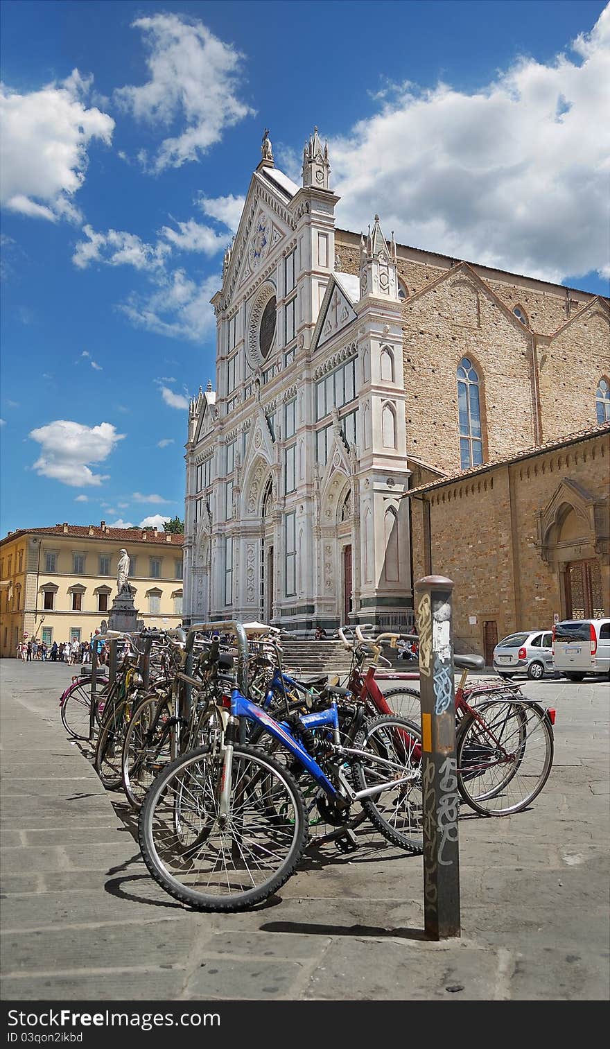 Bicycle parking in front of Basilica Santa Croce (Basilica of the Holy Cross) in Florence, Italia. Bicycle parking in front of Basilica Santa Croce (Basilica of the Holy Cross) in Florence, Italia.