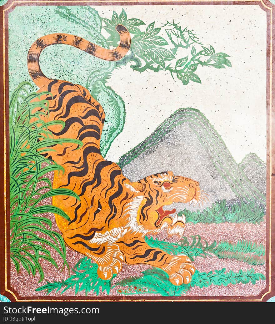 Drawing a tiger on the wall in a Chinese temple