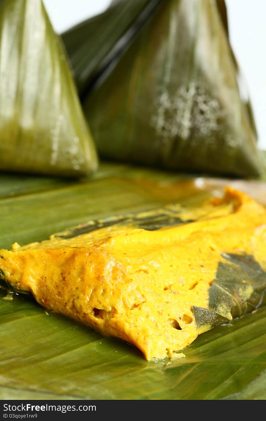 Steamed curry pudding with fish and coconut