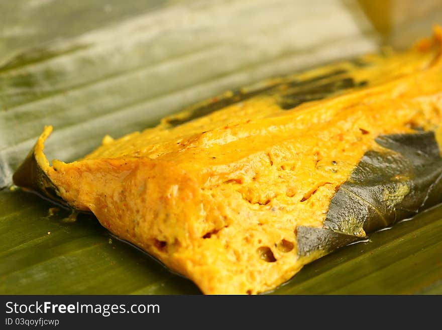 Steamed curry pudding with fish and coconut