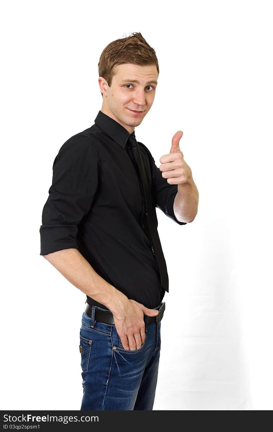 Happy casual young man showing thumb up on white background