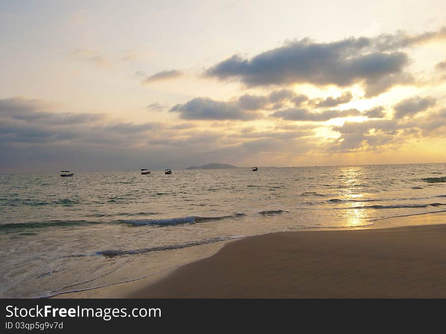 Sunset by the beach in summer