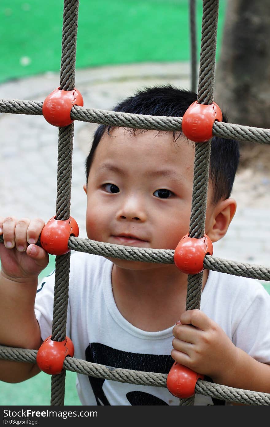 Lovely child in the amusemant park