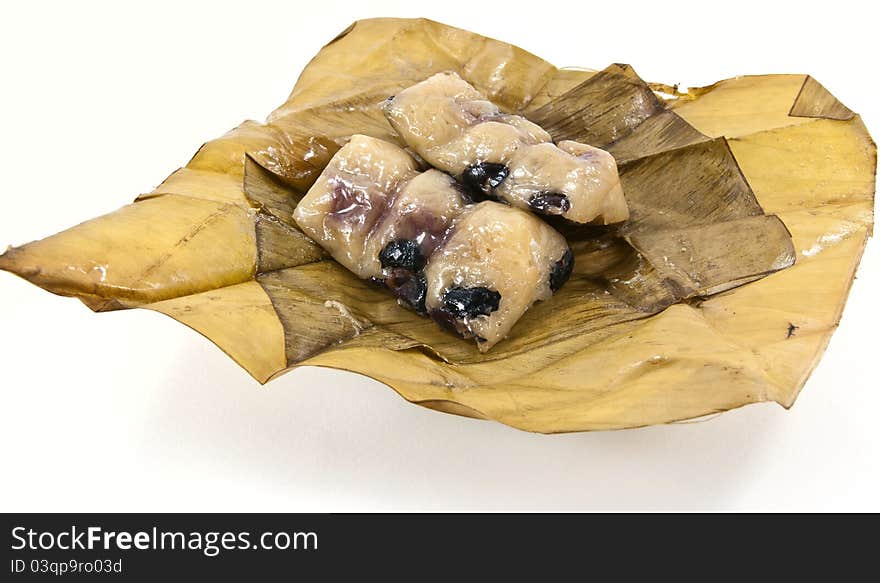 Suman is a rice cake originating from the Philippines. It is made from glutinous rice cooked in coconut milk, and often steamed in banana leaves. Suman is a rice cake originating from the Philippines. It is made from glutinous rice cooked in coconut milk, and often steamed in banana leaves.