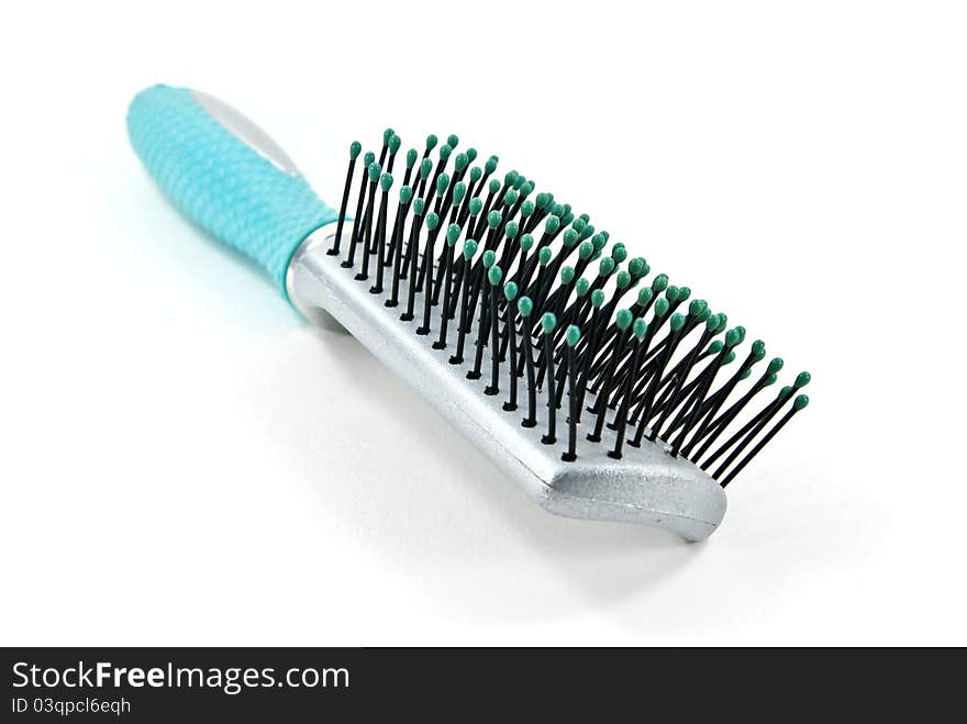 Green hairbrush