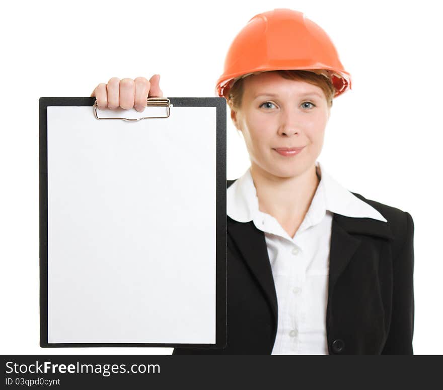 Businesswoman in a helmet shows the blank page.