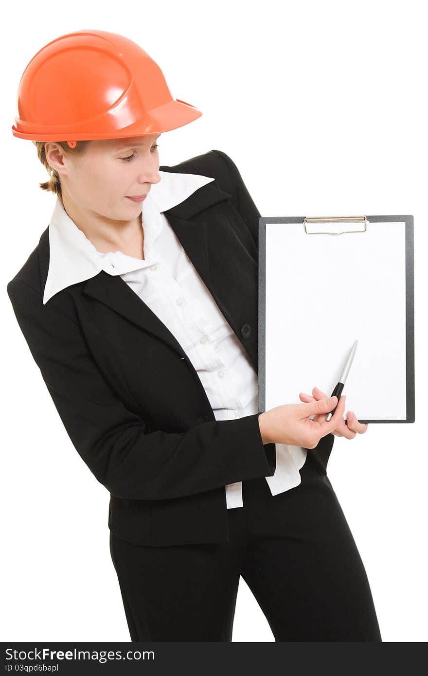 Businesswoman in a helmet shows the blank page on a white background. Businesswoman in a helmet shows the blank page on a white background.