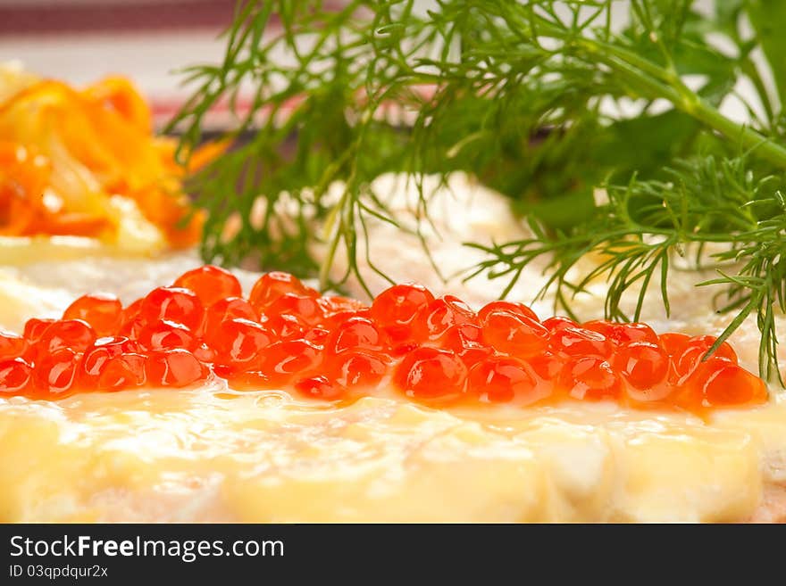 Salmon steak with red caviar