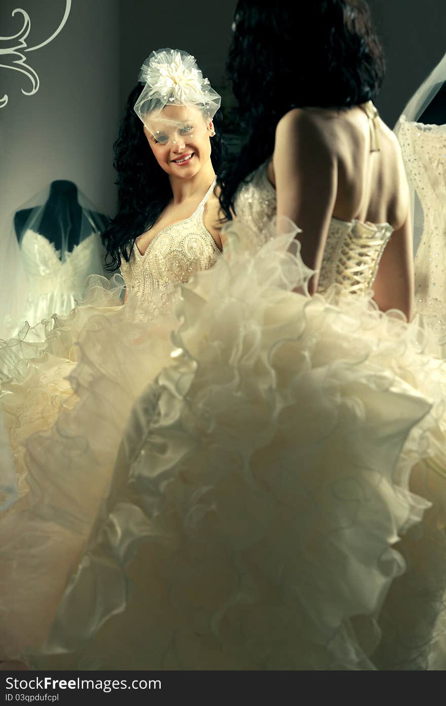 Bride Looking At Mirror