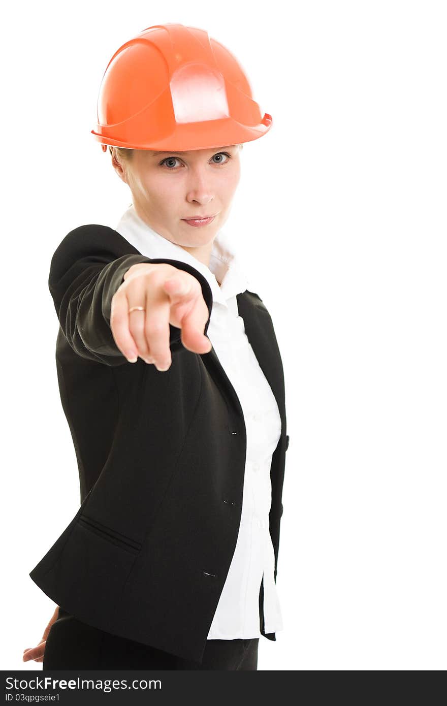 Businesswoman in a helmet shows the finger at the camera on a white background.