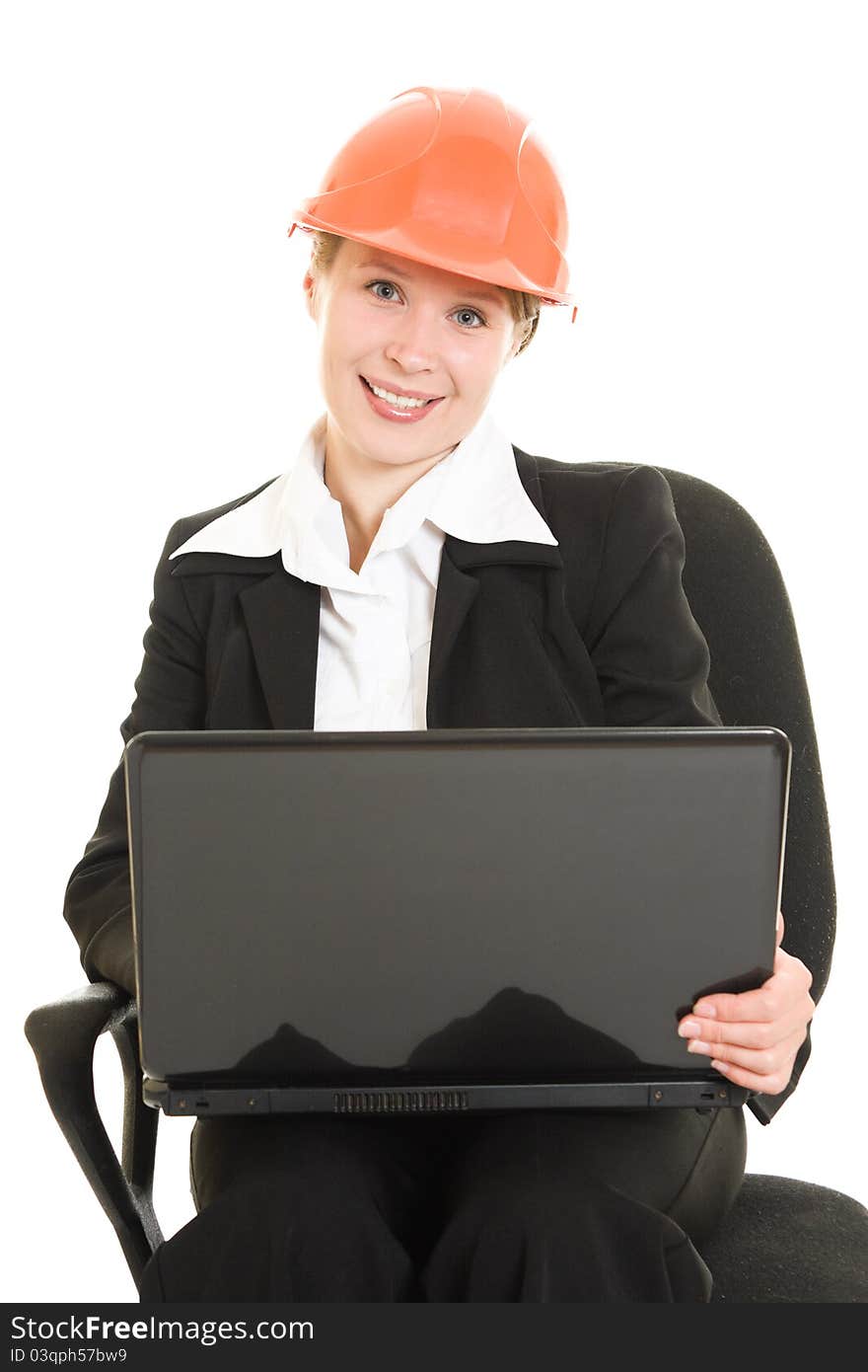 Happy Businesswoman Wearing A Helmet With A Laptop