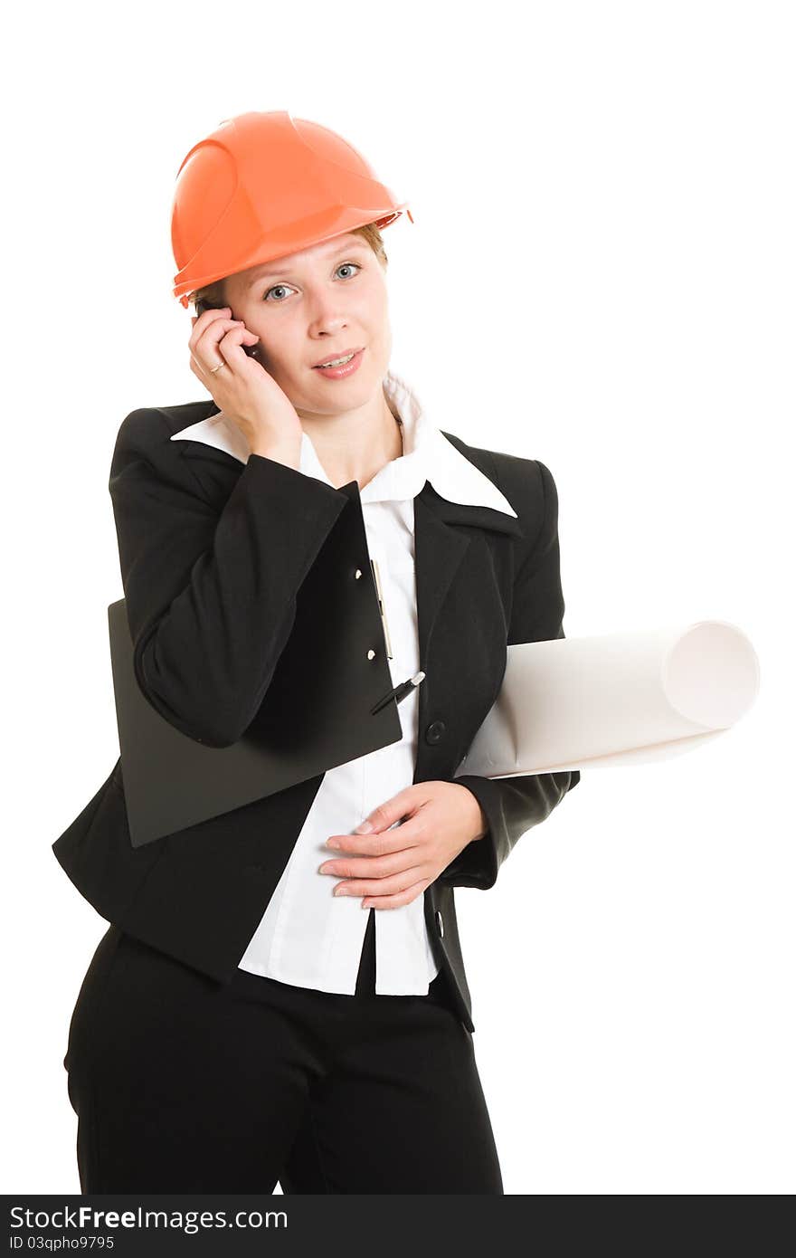 Businesswoman in a helmet with a mobile phone and drawings on a white background.