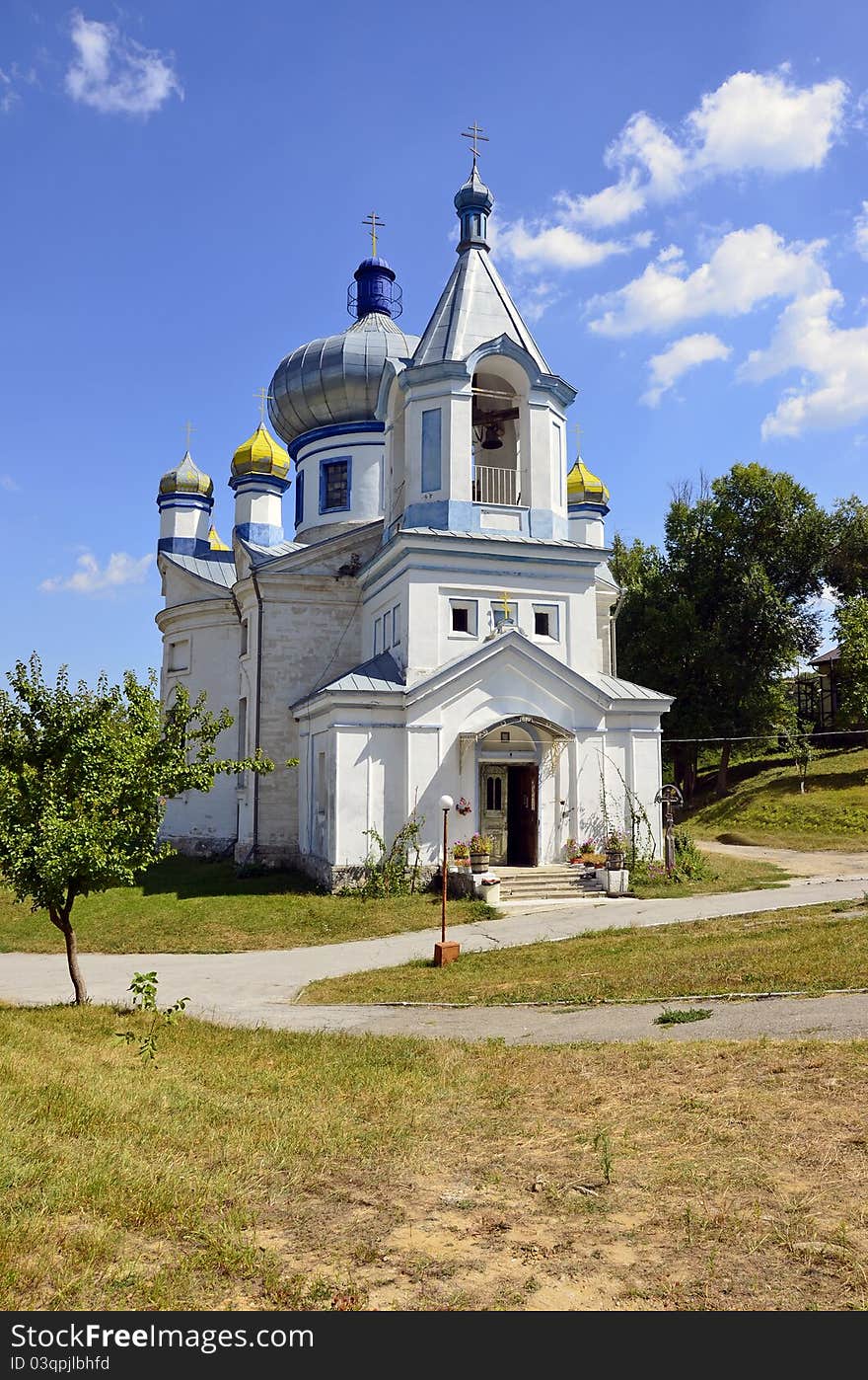 Garden and church of Hancu monastery near Chisinau in Republic of Moldova