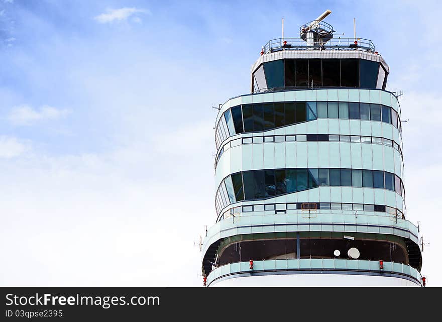 Air traffic control tower on sky