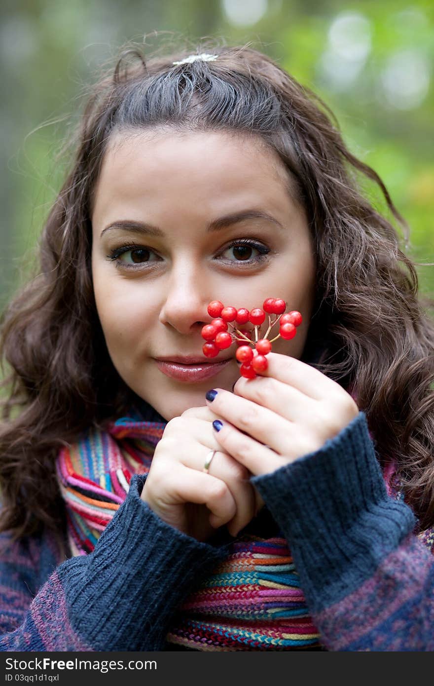 Young woman looking into the camera and smiles. Young woman looking into the camera and smiles