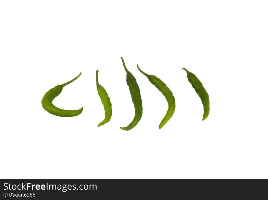 Green chilli pepper on the white background. Green chilli pepper on the white background