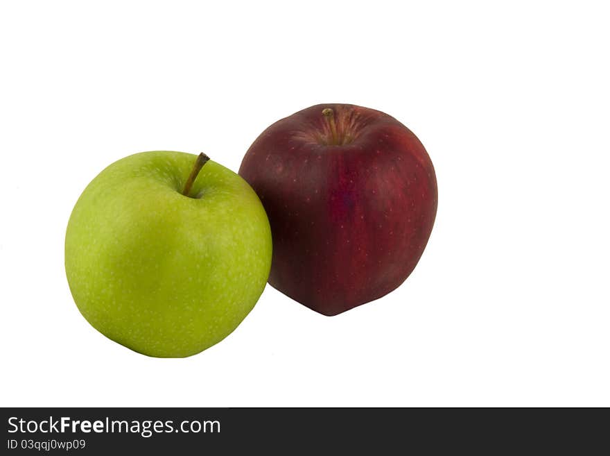 Green and red apples on the white background