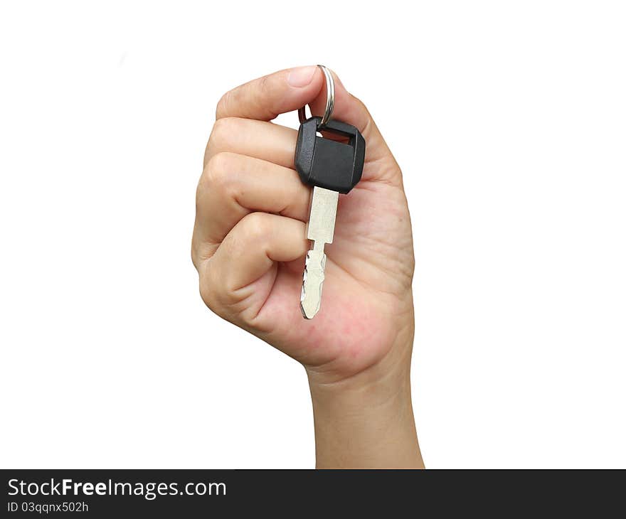 Hand holding key on white background