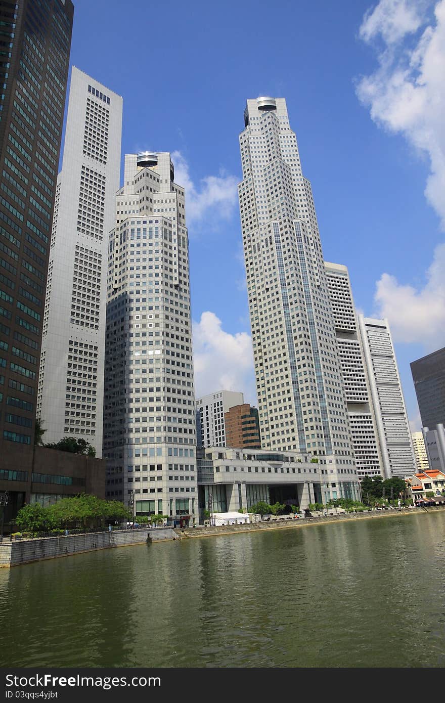 Skyscraper office in the city near river.