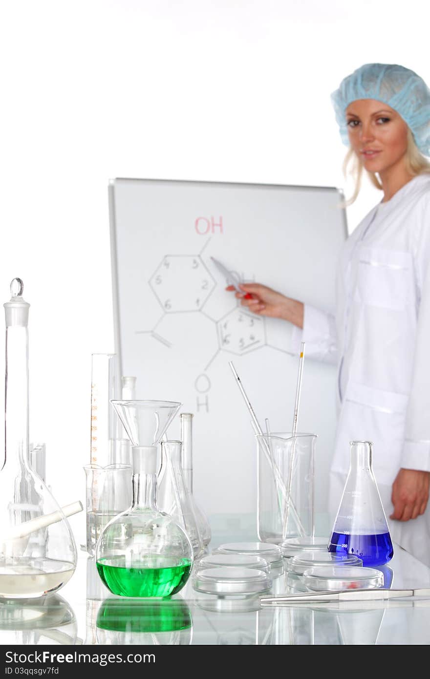 Woman conducting a chemical experimant. Woman conducting a chemical experimant