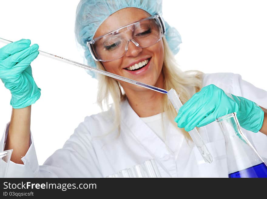 Woman conducting a chemical experimant. Woman conducting a chemical experimant