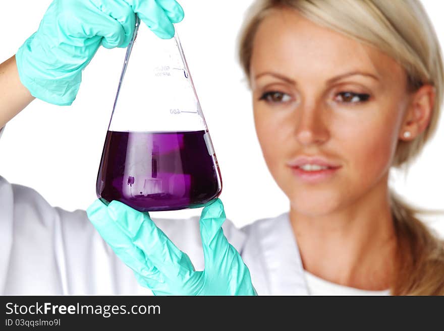 Woman conducting a chemical experimant. Woman conducting a chemical experimant