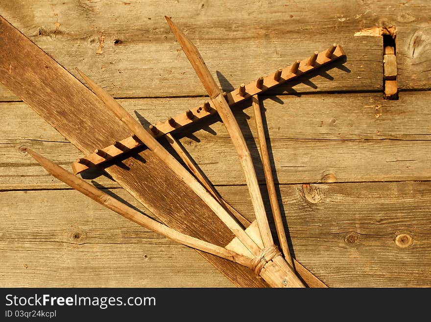 Close-up of old agrarian implements made of wood. Close-up of old agrarian implements made of wood