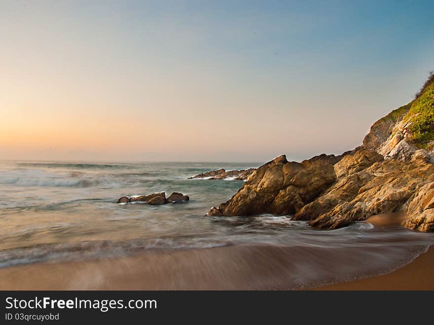 Waves on rocky beach