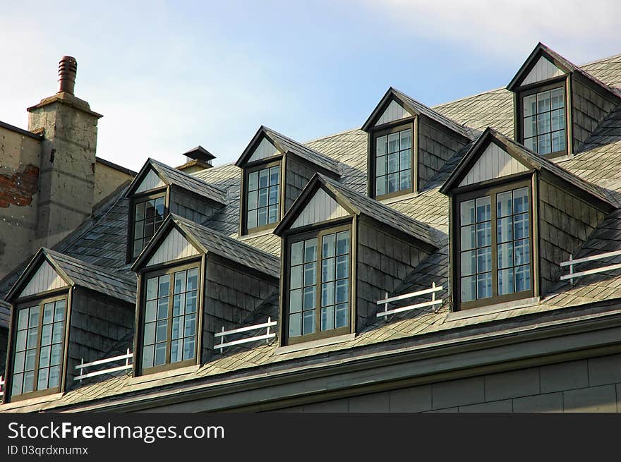 Nice rows of vintage windows on a nice blue sky day