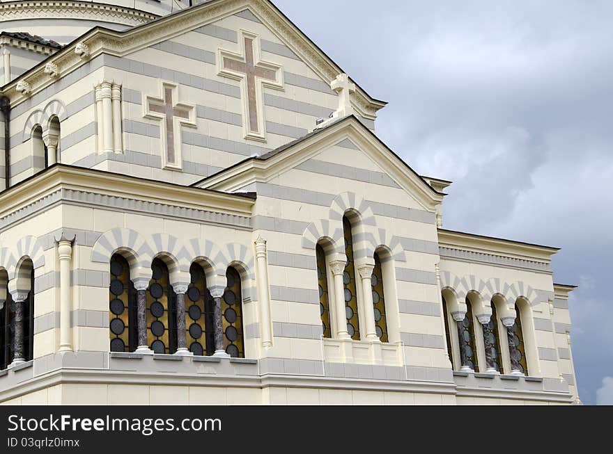 Roof of church against clouds