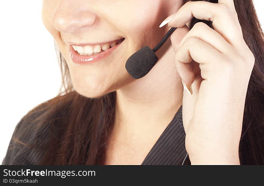 Smiling woman operator with headset close-up