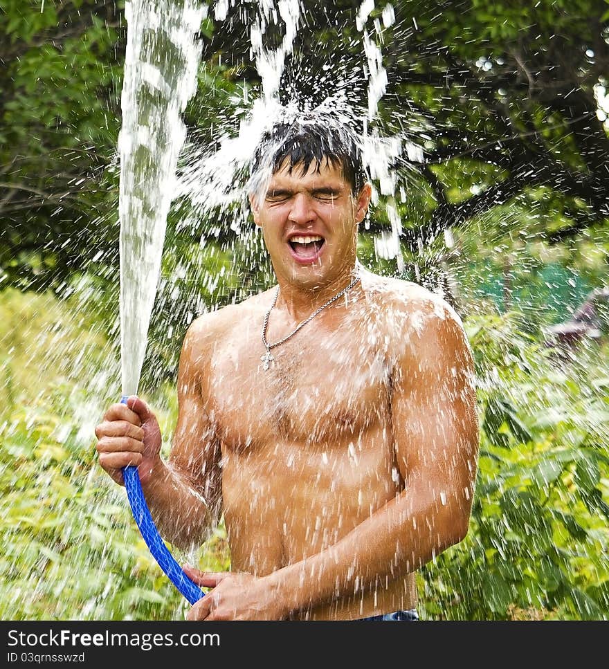 The emotional guy the brunette with water splashes