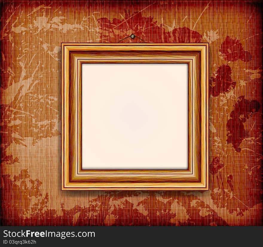 Old wooden frame for photo on the grunge fabric background