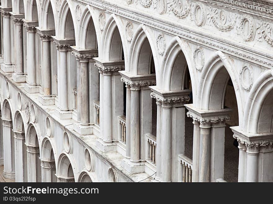 A frame filling pattern of arches from the inner facade of the Doge's Palace in Venice. A frame filling pattern of arches from the inner facade of the Doge's Palace in Venice.