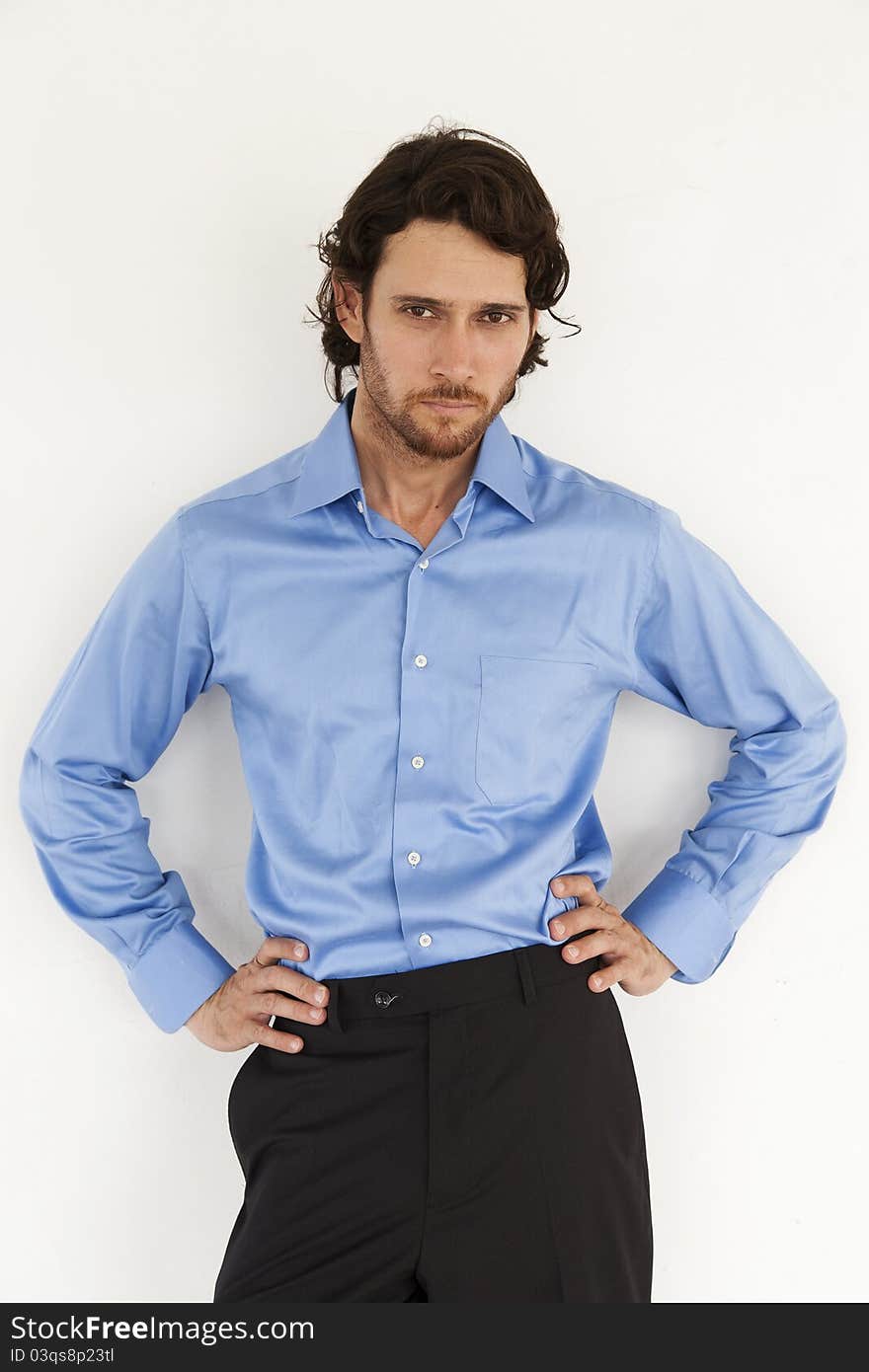 Portrait of a handsome businessman wearing a blue shirt. Portrait of a handsome businessman wearing a blue shirt