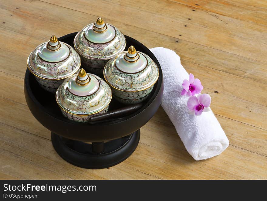 Porcelain use for contain massage oil and white towel. Porcelain use for contain massage oil and white towel