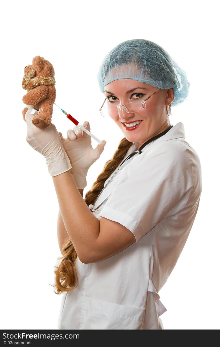 Smiling nurse and syringe