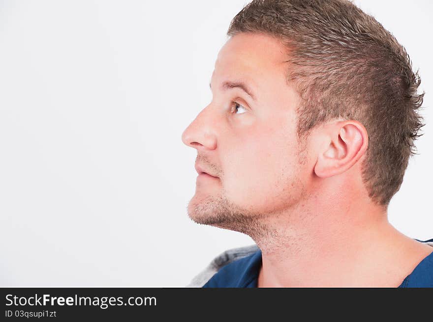 Attractive man close up portrait on white background