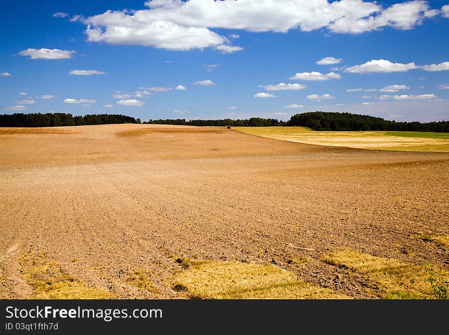 Plowed after wheat cleaning an agricultural field. Plowed after wheat cleaning an agricultural field