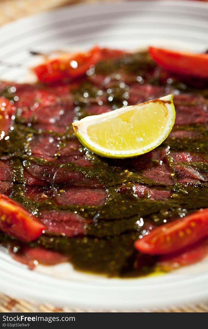 Beef Carpaccio with Tomatoes, Lime and Sauce. Beef Carpaccio with Tomatoes, Lime and Sauce