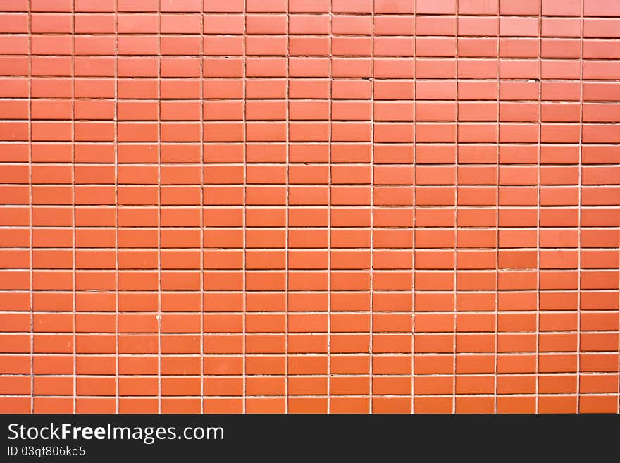 Orange brick wall suitable for texture or background